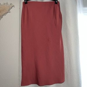 Selling a red midi satin skirt
